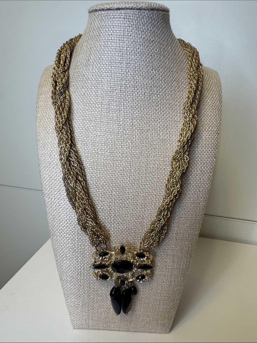 Rope Style Gold-Tone Necklace with Black Crystal Pendant